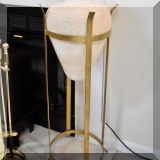 D08. 2 Ceramic vases in tall brass stands. 40”h 